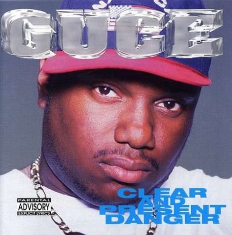 guce_-clear_and_present_danger_-_front_cover.jpg